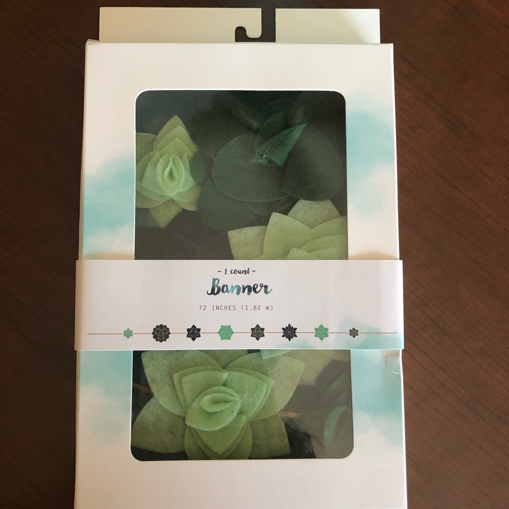 Green floral/leaf banner